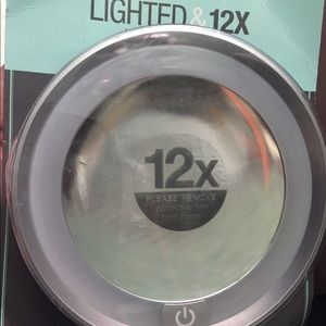 Lighted & 12x magnifying led suction mirror